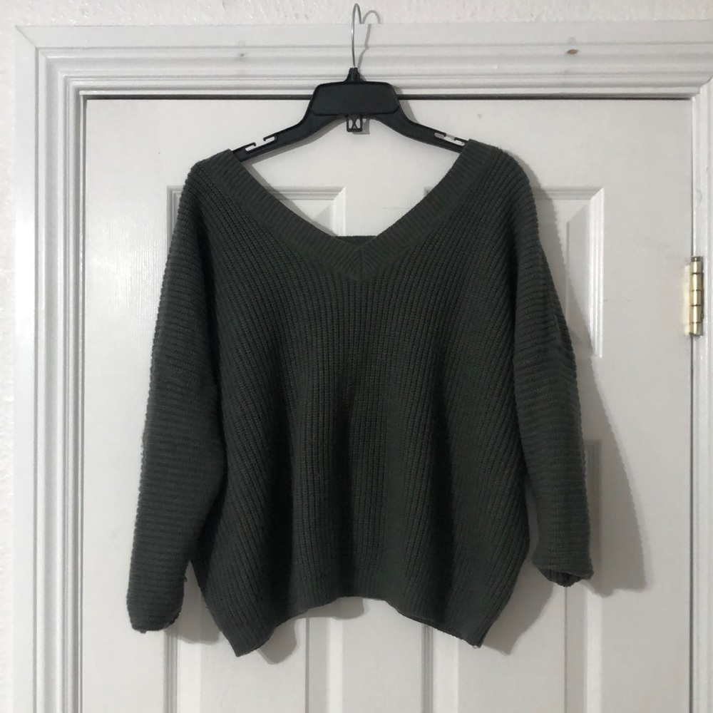 Woman’s off the shoulder sweater: M